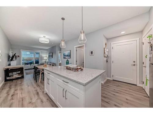 109-150 Shawnee Square Sw, Calgary, AB - Indoor Photo Showing Kitchen