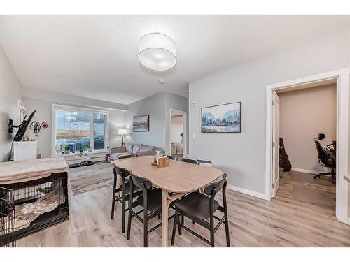 109-150 Shawnee Square Sw, Calgary, AB - Indoor Photo Showing Dining Room