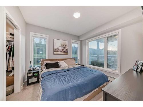 109-150 Shawnee Square Sw, Calgary, AB - Indoor Photo Showing Bedroom