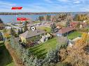 652 East Chestermere Drive, Chestermere, AB  - Outdoor With Body Of Water With View 