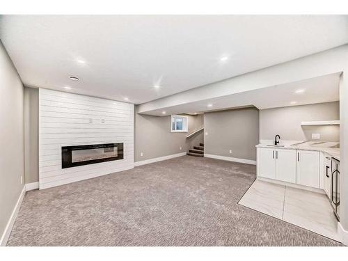 3315 Constable Place Nw, Calgary, AB - Indoor With Fireplace