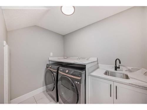 3315 Constable Place Nw, Calgary, AB - Indoor Photo Showing Laundry Room