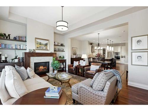 121 Spring Water Close, Heritage Pointe, AB - Indoor Photo Showing Living Room With Fireplace