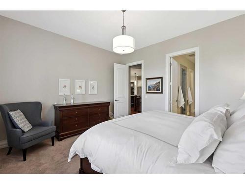 121 Spring Water Close, Heritage Pointe, AB - Indoor Photo Showing Bedroom