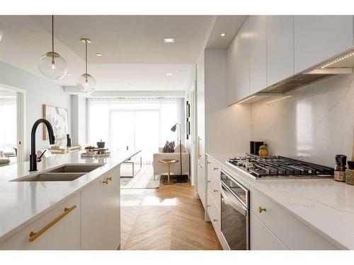 706-8505 Broadcast Avenue Sw, Calgary, AB - Indoor Photo Showing Kitchen With Double Sink With Upgraded Kitchen