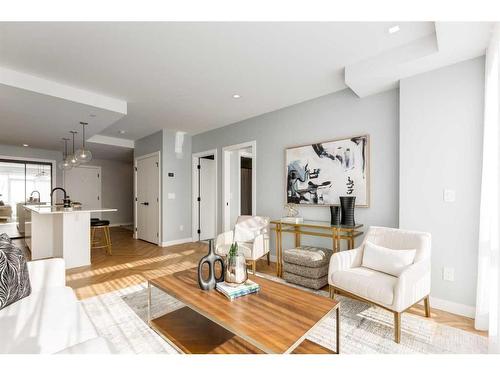 706-8505 Broadcast Avenue Sw, Calgary, AB - Indoor Photo Showing Living Room