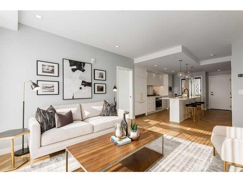 706-8505 Broadcast Avenue Sw, Calgary, AB - Indoor Photo Showing Living Room