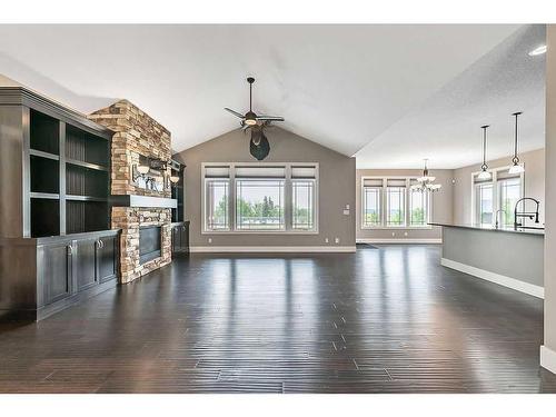 349050 Tamarack Drive East, Rural Foothills County, AB - Indoor Photo Showing Living Room With Fireplace