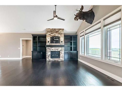 349050 Tamarack Drive East, Rural Foothills County, AB - Indoor Photo Showing Living Room With Fireplace