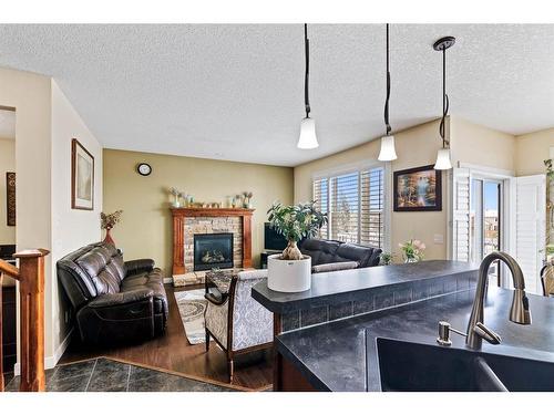 173 Everoak Circle Sw, Calgary, AB - Indoor With Fireplace