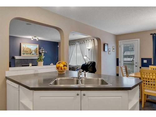 15 Saddletree Drive Ne, Calgary, AB - Indoor Photo Showing Kitchen With Double Sink