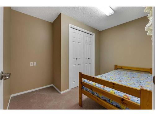 15 Saddletree Drive Ne, Calgary, AB - Indoor Photo Showing Bedroom