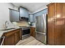 442-10 Discovery Ridge Close Sw, Calgary, AB  - Indoor Photo Showing Kitchen With Double Sink With Upgraded Kitchen 