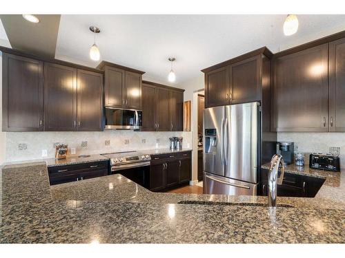 72 Silverado Skies Manor Sw, Calgary, AB - Indoor Photo Showing Kitchen With Double Sink With Upgraded Kitchen