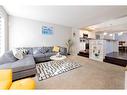 325 Skyview Springs Gardens Ne, Calgary, AB  - Indoor Photo Showing Living Room 