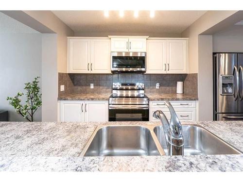 325 Skyview Springs Gardens Ne, Calgary, AB - Indoor Photo Showing Kitchen With Double Sink With Upgraded Kitchen