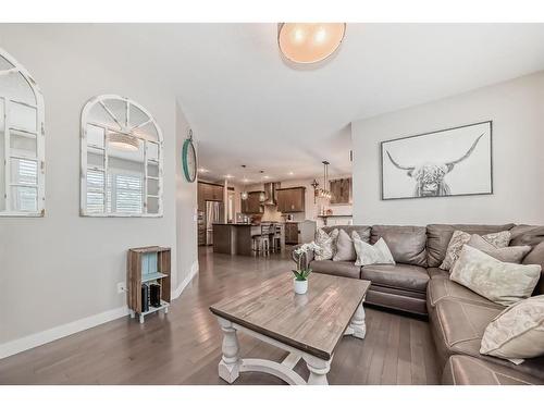 91 Sunset Park, Cochrane, AB - Indoor Photo Showing Living Room