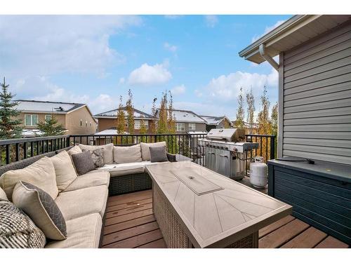 91 Sunset Park, Cochrane, AB - Outdoor With Deck Patio Veranda With Exterior