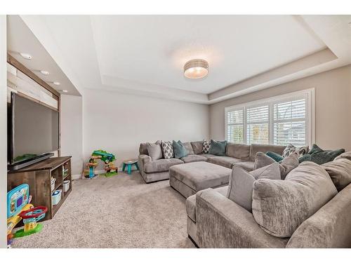 91 Sunset Park, Cochrane, AB - Indoor Photo Showing Living Room