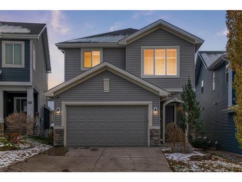 91 Sunset Park, Cochrane, AB - Outdoor With Facade