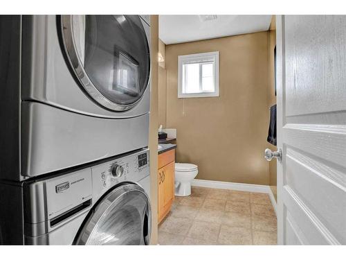 19 Tucker Circle, Okotoks, AB - Indoor Photo Showing Laundry Room