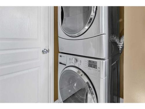 19 Tucker Circle, Okotoks, AB - Indoor Photo Showing Laundry Room