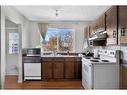 352 Lysander Place Se, Calgary, AB  - Indoor Photo Showing Kitchen With Double Sink 