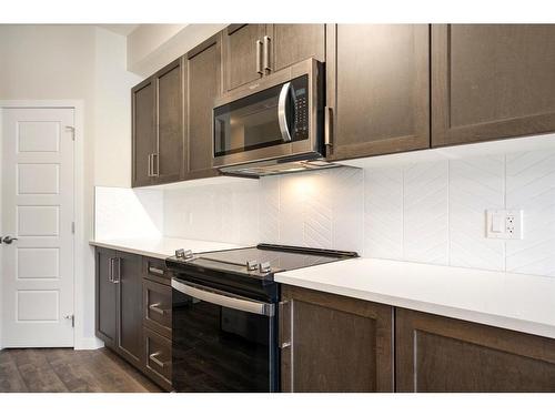 610-32 Red Embers Parade Ne, Calgary, AB - Indoor Photo Showing Kitchen With Upgraded Kitchen