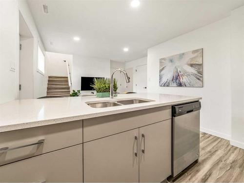 2700 46 Street South, Lethbridge, AB - Indoor Photo Showing Kitchen With Double Sink