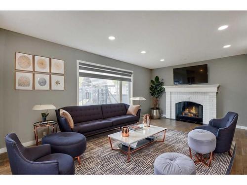 9552 21 Street Se, Calgary, AB - Indoor Photo Showing Living Room With Fireplace