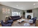 9552 21 Street Se, Calgary, AB  - Indoor Photo Showing Living Room With Fireplace 