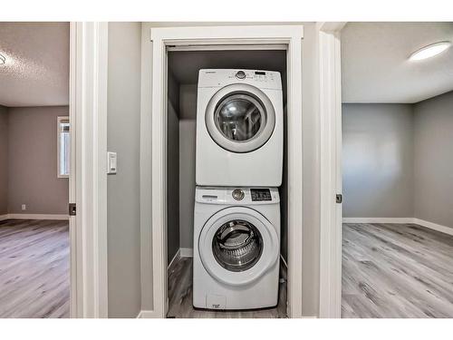 103 Abadan Place Ne, Calgary, AB - Indoor Photo Showing Laundry Room