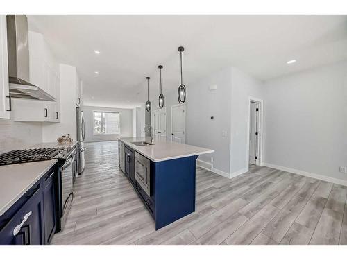 22 Amblehurst Way Nw, Calgary, AB - Indoor Photo Showing Kitchen With Upgraded Kitchen