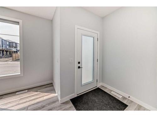 22 Amblehurst Way Nw, Calgary, AB - Indoor Photo Showing Other Room