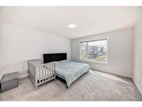 22 Amblehurst Way Nw, Calgary, AB - Indoor Photo Showing Bedroom