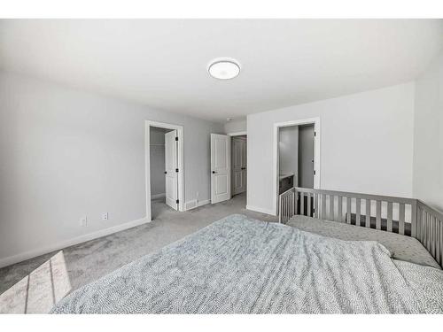 22 Amblehurst Way Nw, Calgary, AB - Indoor Photo Showing Bedroom