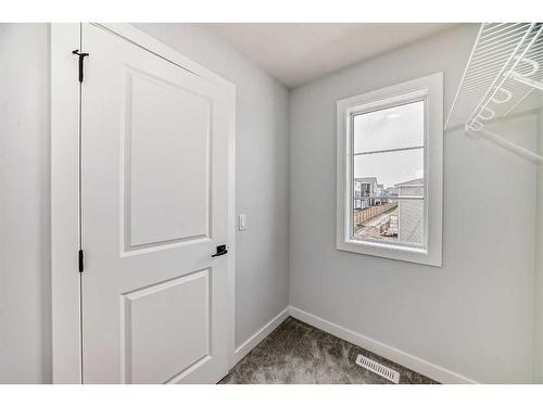 22 Amblehurst Way Nw, Calgary, AB - Indoor Photo Showing Other Room