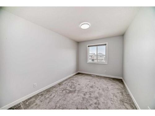 22 Amblehurst Way Nw, Calgary, AB - Indoor Photo Showing Other Room