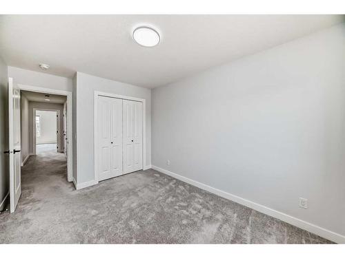 22 Amblehurst Way Nw, Calgary, AB - Indoor Photo Showing Other Room