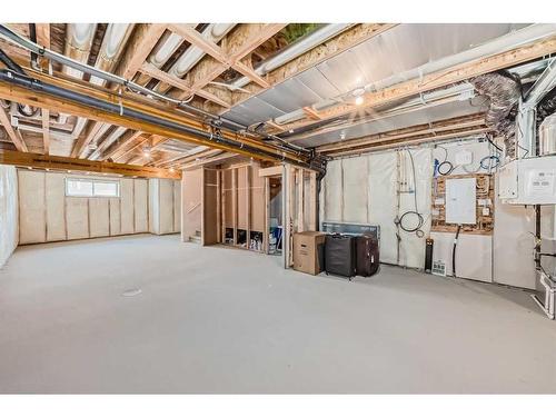 22 Amblehurst Way Nw, Calgary, AB - Indoor Photo Showing Basement