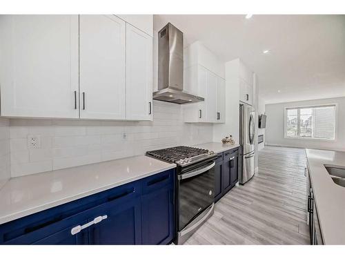 22 Amblehurst Way Nw, Calgary, AB - Indoor Photo Showing Kitchen With Double Sink With Upgraded Kitchen