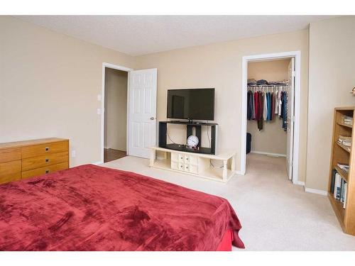 634 Evermeadow Road Sw, Calgary, AB - Indoor Photo Showing Bedroom