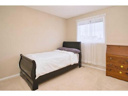 634 Evermeadow Road Sw, Calgary, AB - Indoor Photo Showing Bedroom