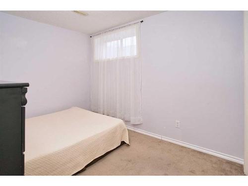 634 Evermeadow Road Sw, Calgary, AB - Indoor Photo Showing Bedroom