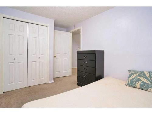 634 Evermeadow Road Sw, Calgary, AB - Indoor Photo Showing Bedroom