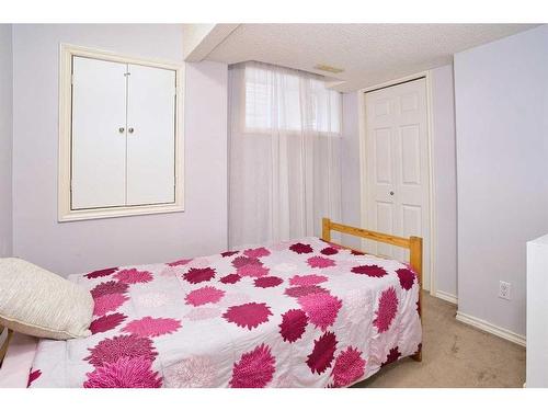 634 Evermeadow Road Sw, Calgary, AB - Indoor Photo Showing Bedroom