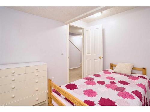 634 Evermeadow Road Sw, Calgary, AB - Indoor Photo Showing Bedroom