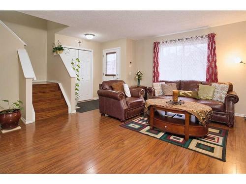 634 Evermeadow Road Sw, Calgary, AB - Indoor Photo Showing Living Room