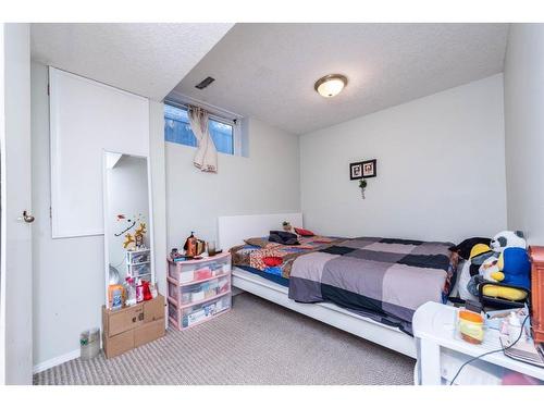 228 Martinvalley Crescent Ne, Calgary, AB - Indoor Photo Showing Bedroom