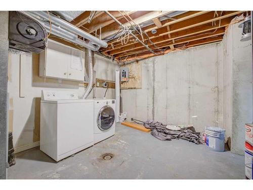 1203-829 Coach Bluff Crescent Sw, Calgary, AB - Indoor Photo Showing Laundry Room